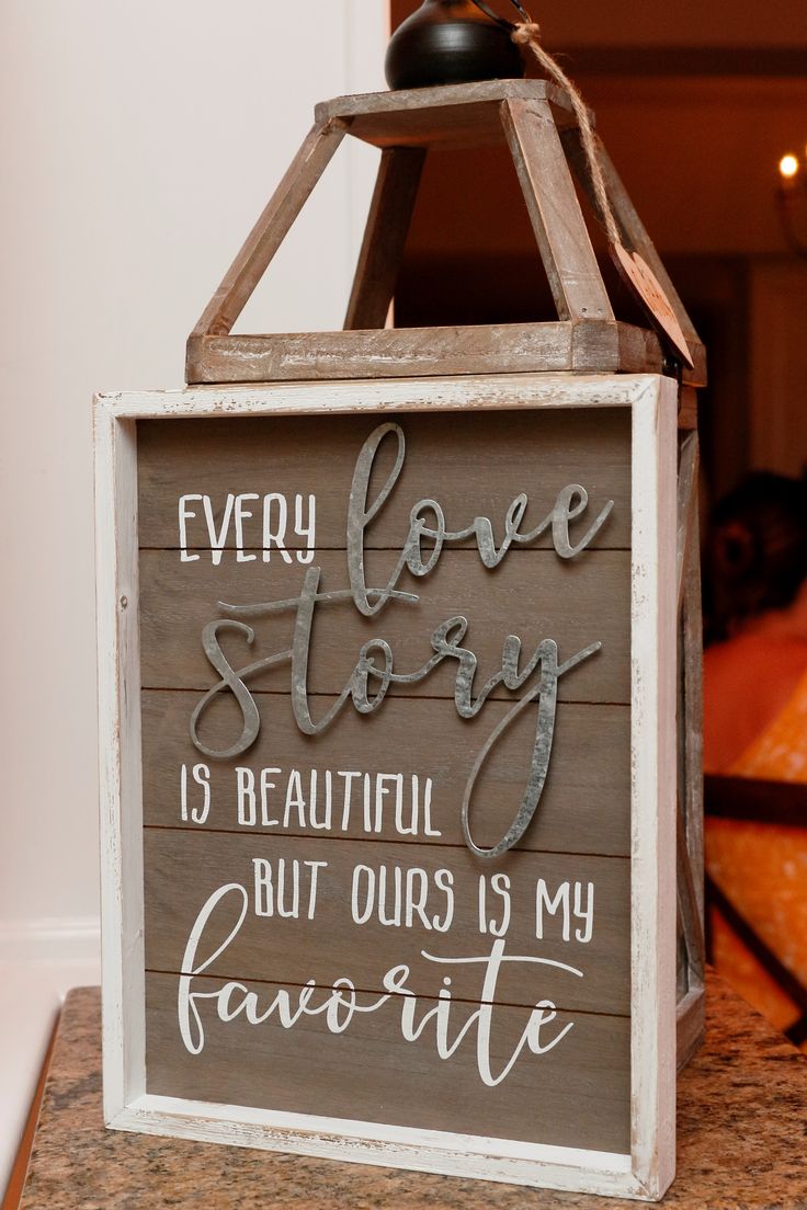 a wooden sign that says every love story is beautiful but ours is my favorite one