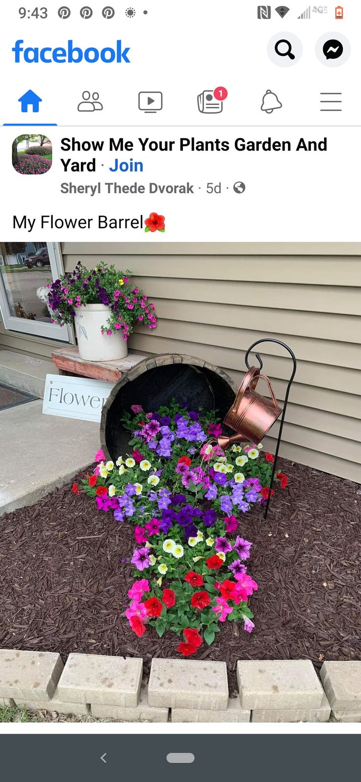 a flower pot with flowers growing out of it