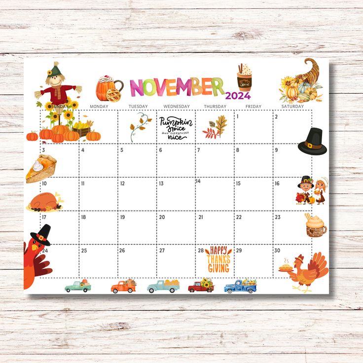 a november calendar with cartoon characters and pumpkins on it, sitting on a wooden surface