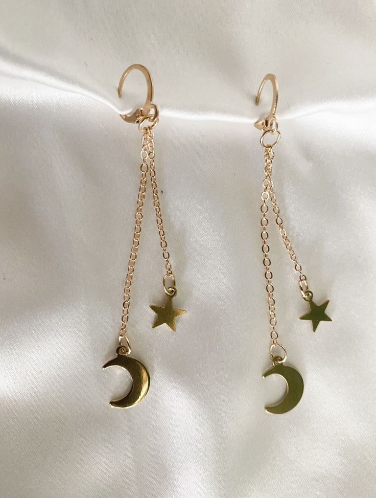 Lightweight and stylish earrings! Gold Dangle Cartilage Earrings For Party, Trendy Dangle Clip-on Earrings, Nickel Free Celestial Earrings, Celestial Style Drop Earrings, Nickel-free Celestial Earrings, Trendy Clip-on Dangle Earrings, Chandbalis Earrings, Celestial Earrings, Stylish Earrings