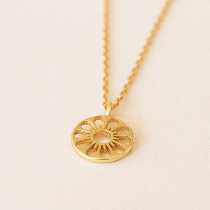 The Daisy Necklace the perfect addition to your favorite necklace stack or a sweet gift for the favorite guy or gal in your life. Designed in house by our very own Sunshine Studios, we're so proud of these gold vermeil necklaces that combine our love for 70's beach culture and dainty jewelry. Everyday 14k Gold Necklaces With Flower Charm, Everyday 14k Gold Necklace With Flower Charm, Yellow Gold Charm Necklaces With Flower Charm, Everyday Gold Plated Jewelry With Flower Charm, Everyday Spiritual Yellow Gold Charm Necklace, Minimalist Yellow Gold Necklace With Flower Charm, Everyday Yellow Gold Flower Pendant Necklace, Everyday Yellow Gold Necklace With Flower Pendant, Everyday Gold Charm Necklaces With Flower Charm