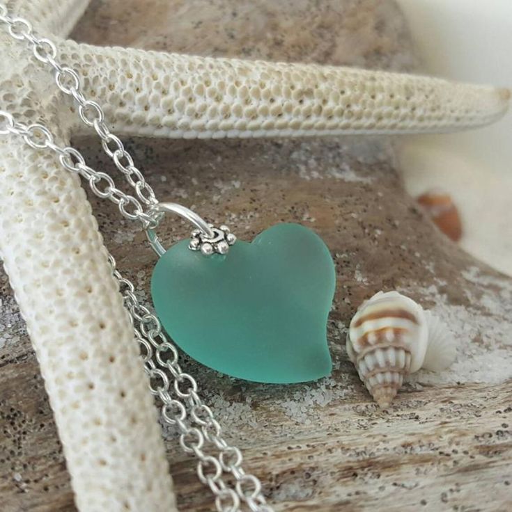 Handmade in Hawaii Aqua heart sea glass necklace March | Etsy Heart Charm Beach Jewelry, Beach Green Jewelry With Heart Beads, Green Heart Beads Jewelry For Beach, Handmade Heart-shaped Beach Necklaces, Handmade Heart Necklace For Beach, Handmade Heart-shaped Necklace For The Beach, Blue Sea Glass Necklace, Hawaii Jewelry, Sea Glass Bracelet