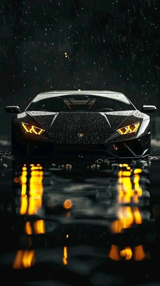 a black sports car in the rain with yellow lights on it's head and eyes