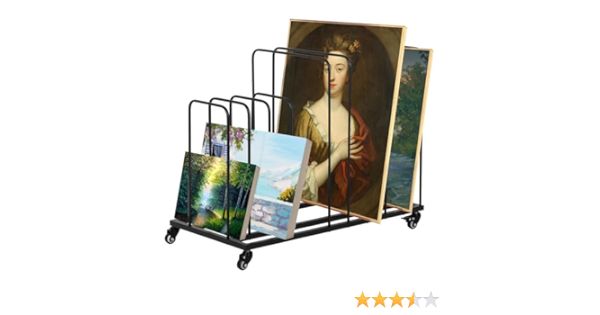 a rack with paintings and pictures on it