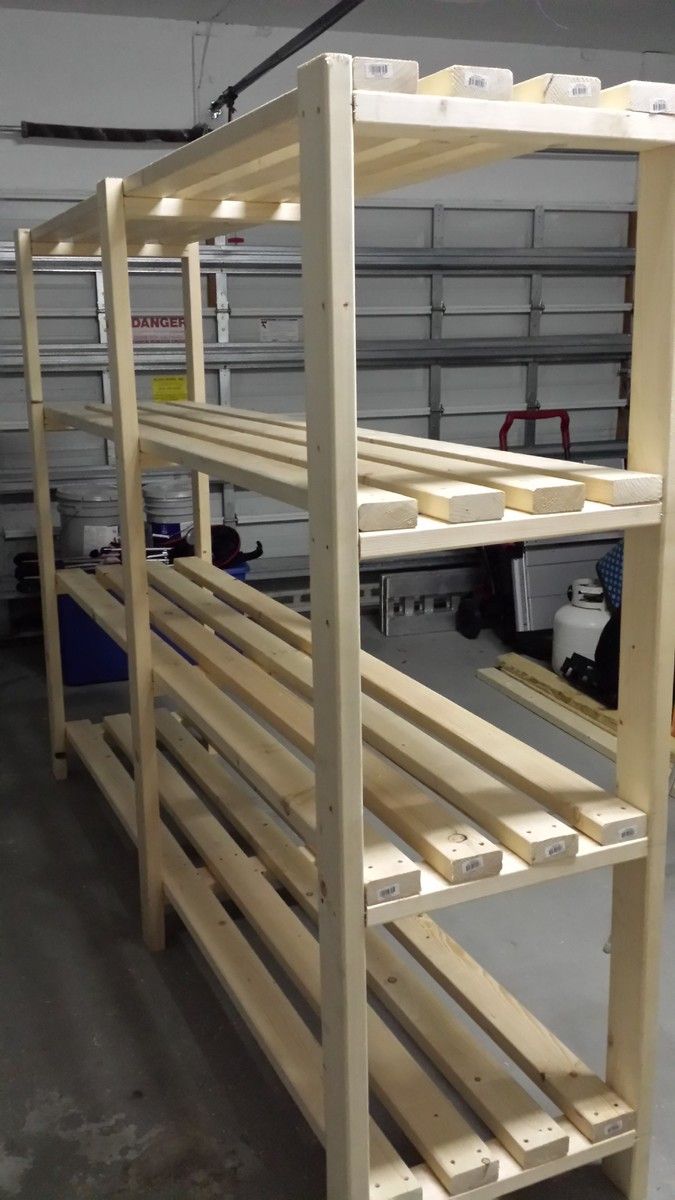 the shelves are made out of wood and ready to be put into storage units for sale