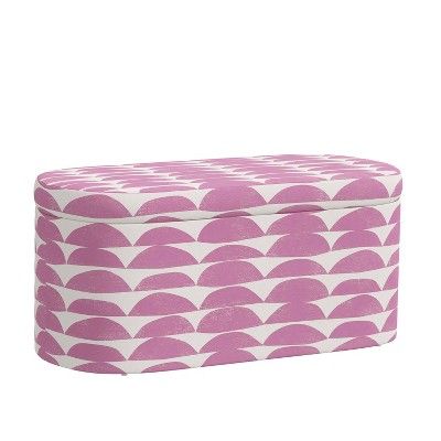 a pink and white box with an abstract design on the lid, sitting against a white background