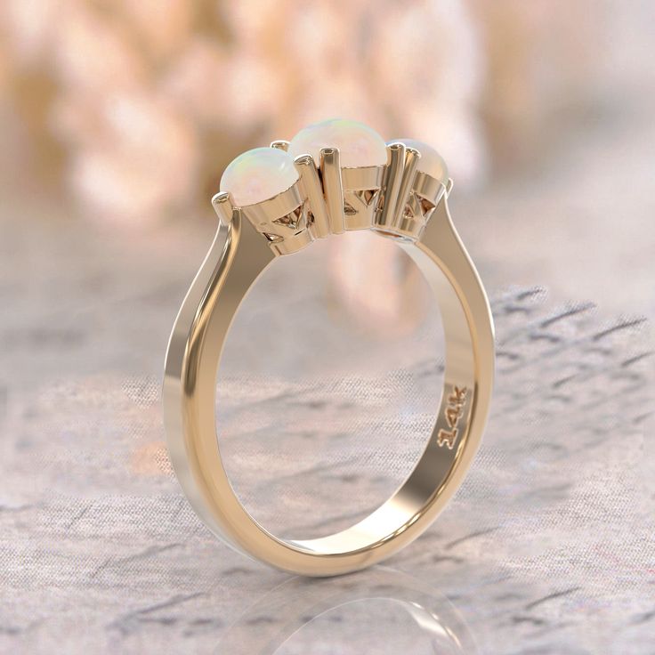 14k 3 opal ring art deco opal engagement ring gold white opal ring Rose Gold Ring October Birthstone opal jewelry minimalist promise ring gift ► FEATURES; Gemstones: natural 3 opal : 5mm ,2x3mm Material options: 14k rose gold, 14k yellow gold, 14k white gold Size: all ring sizes are available How to Order: Please select your preferred size and material from the menu while adding to cart. We pride ourselves to offer customization of almost any shape and style of a ring. If you desire a specific m Formal Opal Ring With Polished Finish, Opal Rings With Polished Finish For Formal Occasions, Formal Opal Rings With Polished Finish, Classic Opal Jewelry With Polished Finish, Fine Jewelry 14k Gold Opal Ring With Polished Finish, 14k Gold Opal Ring With Polished Finish, Classic Ethiopian Opal Ring As Gift, Elegant Gold Opal Ring, White Gold Opal Jewelry With Birthstone