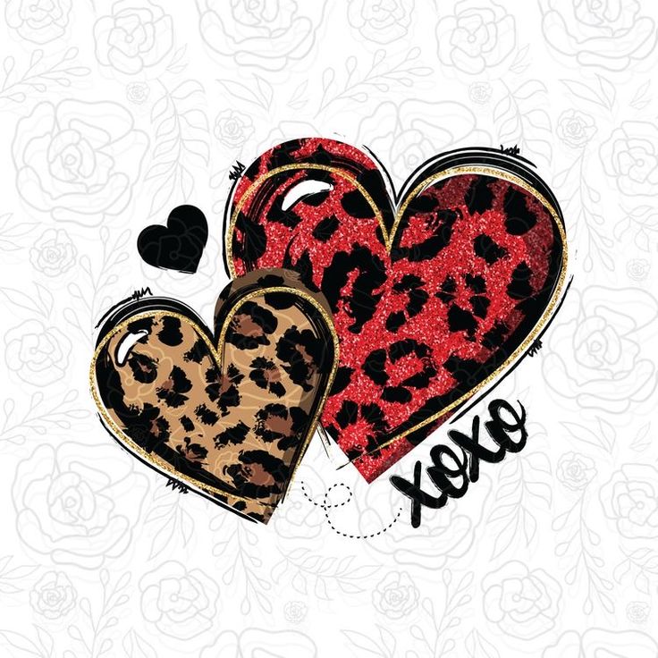 two hearts with leopard print and the words yes on them are in black, red, and gold