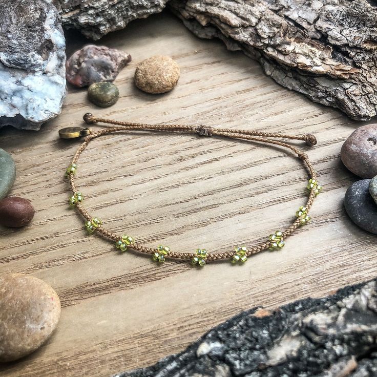 This is a simple way to add a little green to your wrist any time of the year, and it may or may not give the wearer extra luck  The "Clover" bracelet also can help prevent a pinch on St. Patrick's Day too! This bracelet matches perfectly with the "Shamrock (peridot green)" charm bracelet: https://colorsoftheprairie.etsy.com/listing/1673648742  Please keep in mind that even though I try my best to keep the spacing even between clovers, I'm not a machine and the spaces are not all perfectly equal Green Adjustable Jewelry For Festivals, Green Adjustable Jewelry For Festival, Green Adjustable-length Jewelry For Festival, Hippie Green Bracelet Jewelry, Nature-inspired Adjustable Beaded Bracelet With Round Beads, Adjustable Beaded Nature-inspired Bracelet, Green Bohemian Beaded Everyday Bracelets, Hippie Green Friendship Bracelets As Gift, Handmade Green Hippie Braided Bracelets