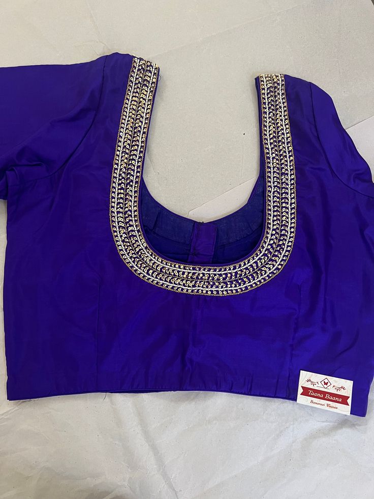 Description  1- fabric - Silk 2-color- purple  3- sleeve length -10" 4-Size-36" can be open till 40" 5- nake front deep 7/12" and back 10" 6- princes cut front open blouse Please contact us if you have any questions regarding the product. Long Sleeve Purple Choli With Pallu, Purple Long Sleeve Choli With Pallu, Purple Silk Formal Blouse, Formal Purple Silk Blouse, Purple Silk Long Sleeve Tops, Bollywood Style Purple Choli With Long Sleeves, Elegant Purple Silk Blouse, Long Sleeve Purple Silk Tops, Purple Long Sleeve Bollywood Choli