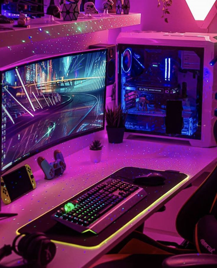 a computer desk with two monitors and a keyboard on it in front of a purple background