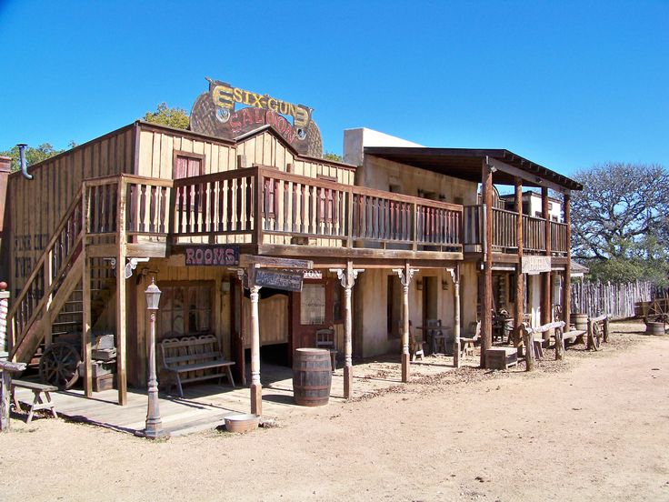 an old western town with wooden balconies