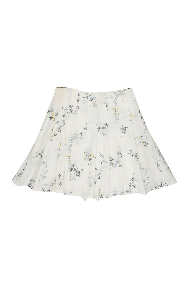 Show off you passion for petals in this adorable skirt from A.P.C.! The floral print and ruffles on this skirt are perfect for a spring outing or even for your Easter outfit! Wear it with a pastel tank and jean jacket for a fresh and flouncy look. Size 6 Shell: 100% Cotton Lining: 100% Viscose Buttons down front Lined Flared skirt w/ pleats Ruffles along front buttons Floral print design Waist 30" Total length 19" Boyfriend Cut Jeans, Cream Skirt, Floral Print Design, Chic Shop, Short Cocktail Dress, Easter Outfit, Flared Skirt, Cut Off Shorts, Flare Skirt