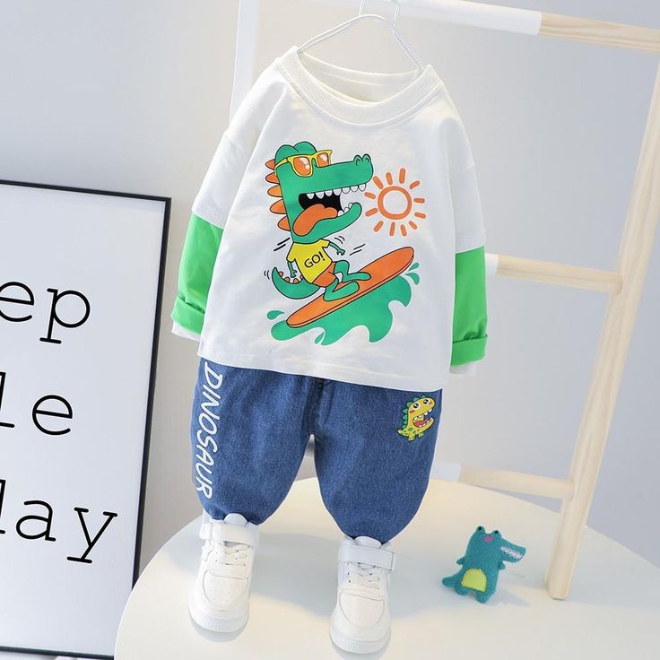 Baby Boy Splicing Cartoon Surfing little Dinosaur Sets Boys Casual Suitoy - PrettyKid Green Cotton Sets With Character Print, Playful Green Sets With Character Print, White Long Sleeve Patchwork Sets, Casual Playtime Sets With Character Print, White Cotton Sets With Character Print, White Character Print Summer Sets, White Character Print Sets For Summer, White Playwear Set With Character Print, White Sets With Cartoon Print For Spring