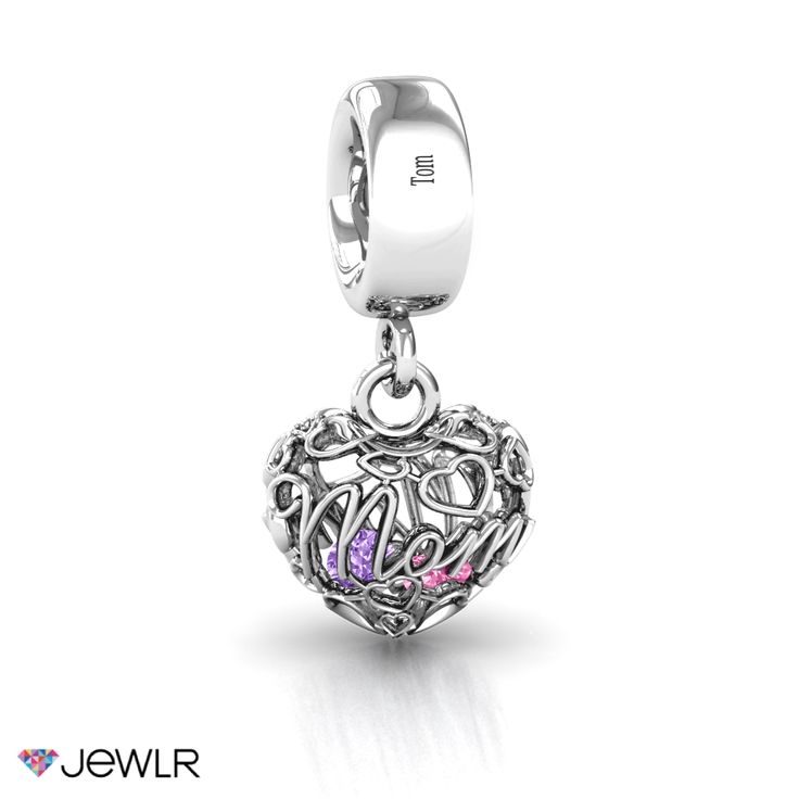 What mother wouldn't love a stunning charm to wear that holds the birthstones of all of her children? Wherever a mother wearing this charm goes, her babies will be with her. The gorgeous heart shaped charm featuring the word "mom" in cursive writing holds up to 4 dazzling birthstones and keeps them safe and protected as they shine through. Mother's Day Jewelry With Heart Charm And Cubic Zirconia, Mother's Day Cubic Zirconia Heart Charm Jewelry, Heart Charm Jewelry For May Birthstone, Cubic Zirconia Jewelry With Removable Charms For Gift, Heart Charm Jewelry For Mother's Day, Sterling Silver Dangling Charms Jewelry For Mother's Day, Mother's Day Heart Beads Dangle Jewelry, Mother's Day Sterling Silver Jewelry With Dangling Charms, Anniversary Jewelry With Removable Heart Charms