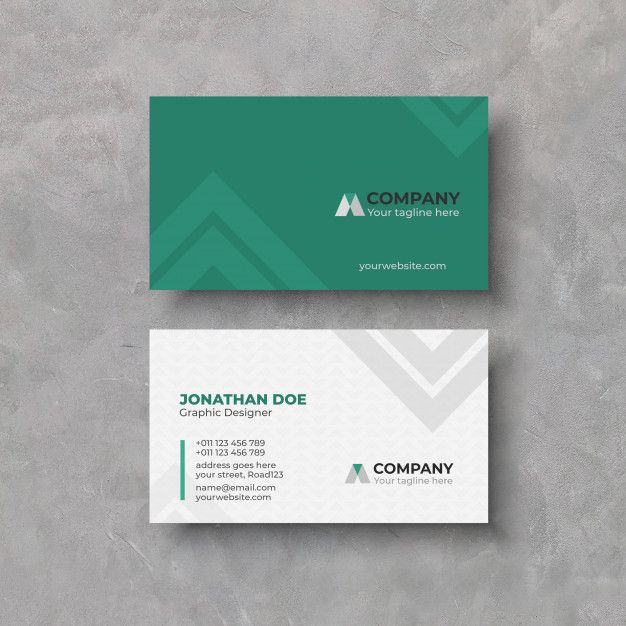 a business card with a green and white design on the front, and an arrow logo on the back