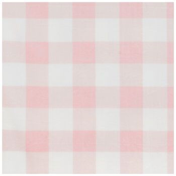 a pink and white checkered fabric with a ruler