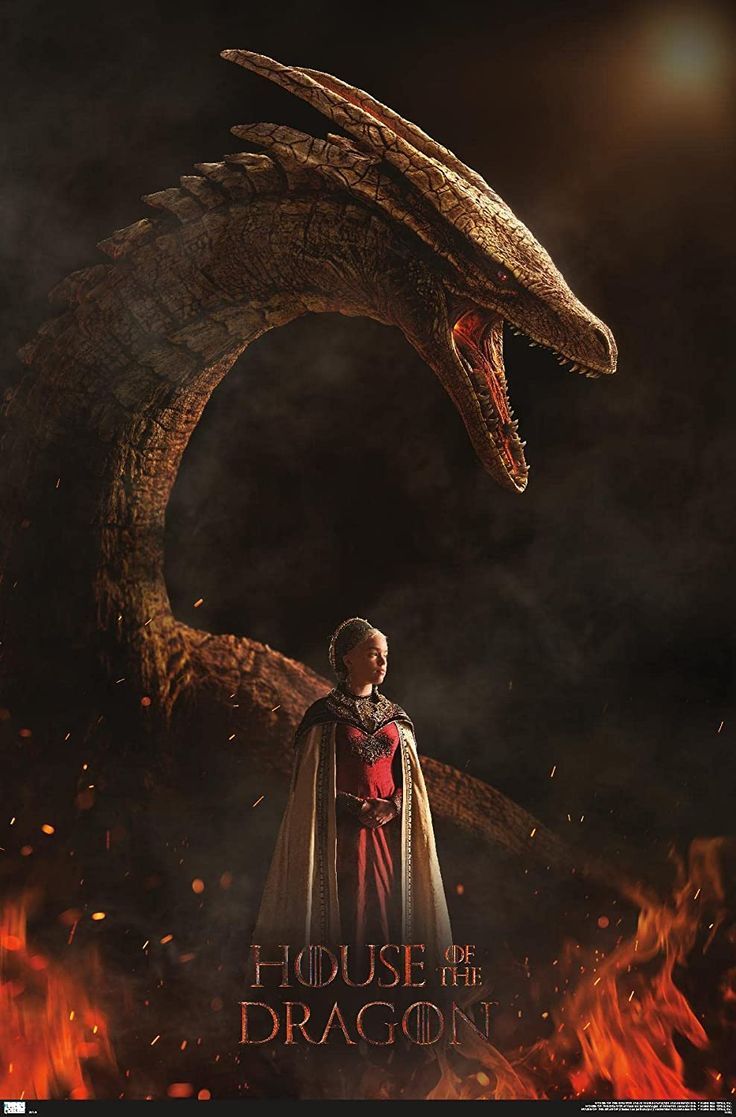 a woman standing in front of a dragon with her hand on her hip and wearing a red cape