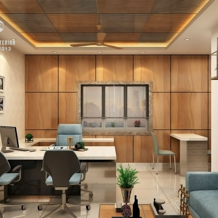 an office with wood paneling and blue chairs