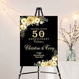 an easel with a sign that says welcome to our 50th anniversary and is decorated with flowers