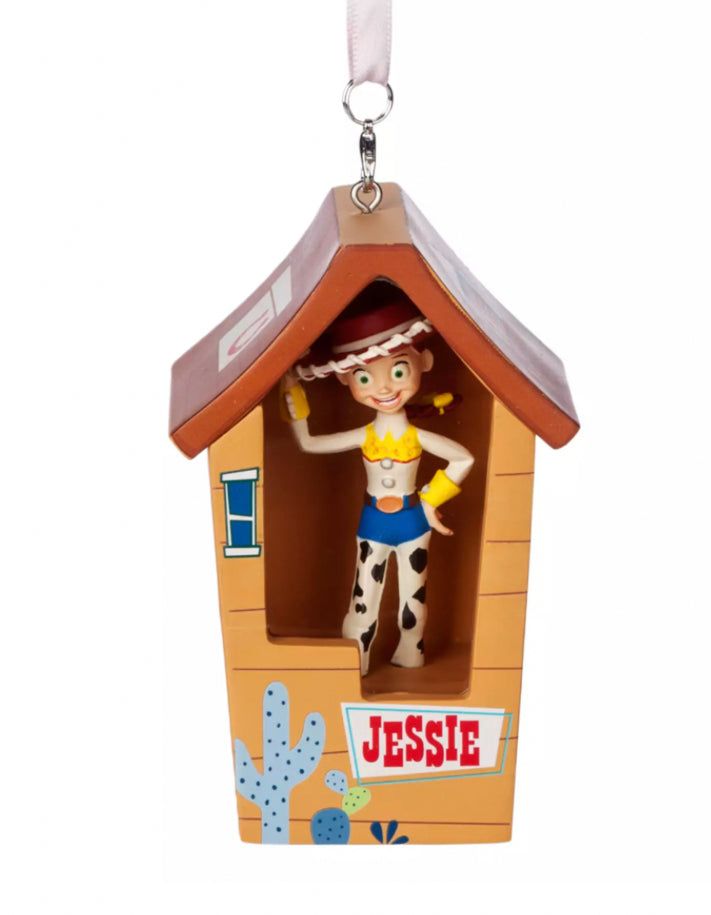 a cowgirl ornament hanging from a key chain