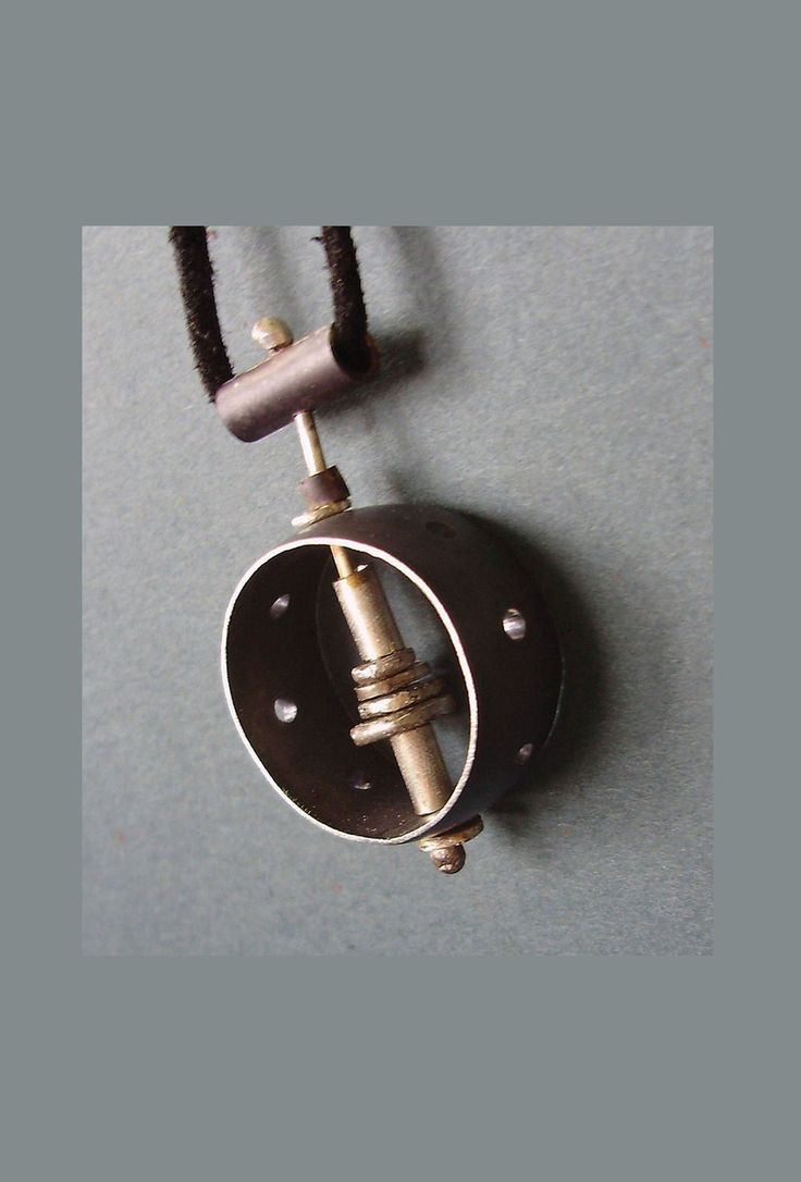 "This unique pendant is one of a kind with a unisex design. Modern, and contemporary style, handmade from sterling silver wire, forged silver, and pierced silver formed into a ring, oxidized black. Pendant measures approximately 1\" diameter, includes 18\" silver chain or leather cord. All jewelry is boxed and ready for gift giving. DETAILS: ~ Components are sterling silver  ~ Pendant measure approximately 1\" diameter ~ Ships at no extra charge. ~ Gift wrapping option available at checkout. Include your own special message in the card. ~ Handmade in Austin, Texas ❤️YOU MAY ALSO LIKE THESE ITEMS❤️ https://www.etsy.com/listing/72429573/radius?ref=shop_home_active_58&frs=1 https://www.etsy.com/listing/35670591/silver-domes-with-copper?ref=shop_home_active_53&frs=1 https://www.etsy.com/listin Minimalist Hand Cast Jewelry With Round Pendant, Hand Cast Adjustable Modern Jewelry, Hand Cast Modernist Jewelry For Gifts, Modern Oxidized Jewelry With Round Pendant, Modern Oxidized Round Pendant Jewelry, Modern Oxidized Pendant Jewelry, Modern Hand Cast Jewelry As Gift, Modernist Hand Cast Jewelry As Gift, Modernist Hand-cast Jewelry For Gifts