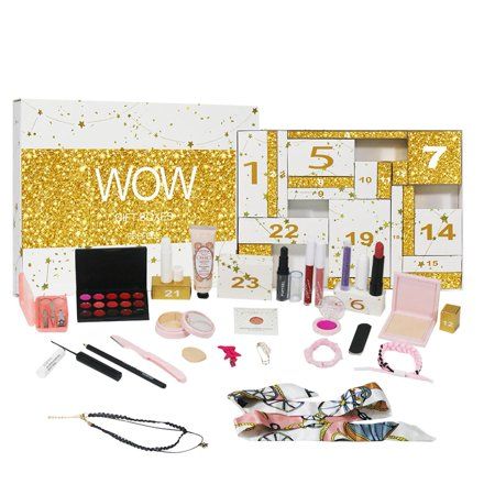 an assortment of makeup and accessories in a box with the word wow written on it