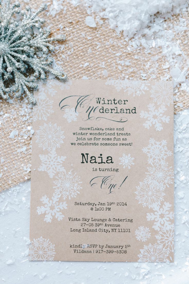 the winter wonderland wedding card is on top of snow flakes