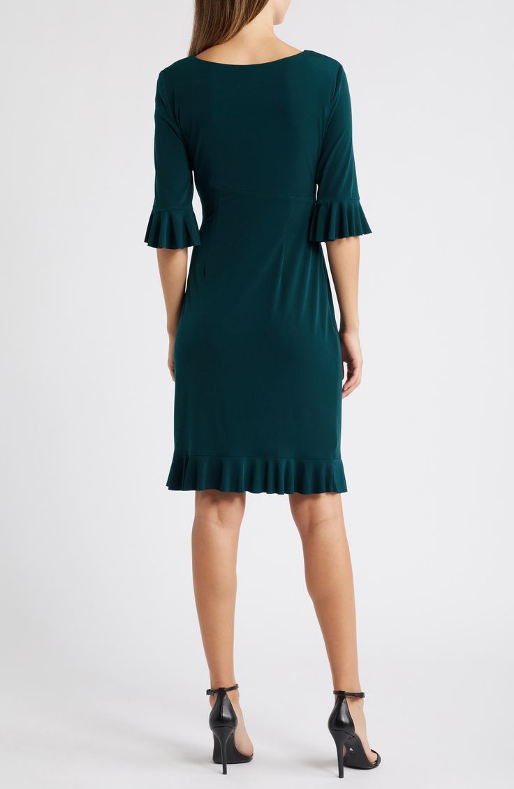 Stretch-enhanced fabric offers desk-to-dinner comfort in a dress framed by ruffled sleeves and finished with front pleats for a gathered affect. 40" length (size 8) Jewel neck Elbow-length sleeves Partially lined 100% polyester Machine wash, tumble dry Imported Elegant V-neck Pleated Dress With Ruffles, Elegant Green V-neck Ruffle Dress, Formal Ruched Fit And Flare Dress, Fit And Flare Knee-length Midi Dress With Ruffle Hem, Knee-length Fit And Flare Midi Dress With Ruffle Hem, Knee-length Dresses With Gathered Sleeves, Knee-length Dress With Stretch And Gathered Sleeves, Stretch Knee-length Dress With Gathered Sleeves, Elegant Ruffled Viscose Midi Dress