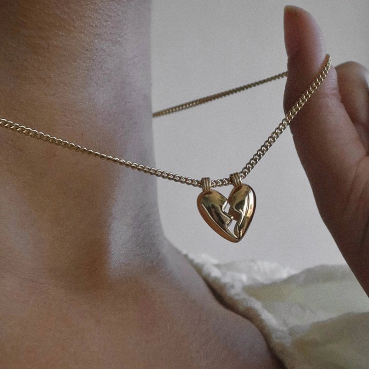 Heartbreak never looked so good - embrace all that love entails (including the messy) with the Mod + Jo Taryn Broken Heart Necklace. Delicately strung on a classic curb chain, this is not your average heart necklace. Gold plate over brass 16-18" in length Nickel, brass, and lead-free Heart-shaped Metal Necklaces For Friendship, Heart-shaped Metal Necklace For Friendship, Friendship Necklace With Heart Pendant And Charm, Friendship Necklace With Heart Pendant, Heart-shaped Adjustable Chain Necklace For Friendship, Heart-shaped Friendship Necklaces With Adjustable Chain, Heart-shaped Friendship Necklace With Adjustable Chain, Friendship Heart Necklace With Adjustable Chain, Dainty Heart Necklace For Friendship