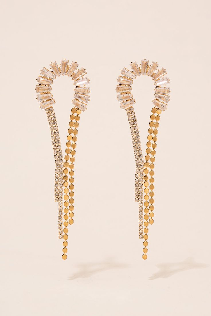 The Vega Half Loop Drop Earrings are the perfect finishing touch to any outfit. The finish adds a touch of glamour, while the rhinestone accents add a touch of sparkle. These earrings are designed with a half loop drop, giving them a unique and eye-catching look. Whether you're dressing up for a special occasion or just looking to add some flair to your everyday look, these earrings are sure to impress. Plus, with their affordable price and trendy design, they make a great gift for any friend or Pearl Shop, Holiday Essentials, Rhinestone Embellishments, Dressing Up, Pearl Set, Gold Rhinestone, Halloween Birthday, Gold Drop Earrings, Pearl Ring