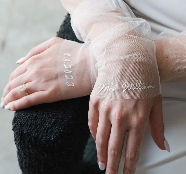 a woman's arm with her name written on it