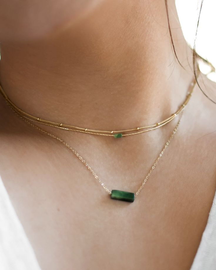 𝗘𝗮𝘀𝘆 𝗧𝗼 𝗦𝘁𝘆𝗹𝗲, 𝗠𝗮𝗱𝗲 𝗧𝗼 𝗟𝗮𝘀𝘁 Our dainty jade gemstone necklaces are easy to layer and ready to be worn on repeat. Created to last a lifetime, these necklaces will remain evergreen even as the years and trends come and go! - Small rectangle stone measures 4mm - Small round stone measures 5mm - Large rectangle stone measures 13mm - Large rectangle stone measures 13mm  Looking for a specific shade of stone? You may request this in the "note to seller" box at checkout! We will do Minimalist Jade Gemstone Jewelry, Minimalist Jade Jewelry For May Birthstone, Dainty Gold Jade Necklace, Minimalist Birthstone Jewelry For Layering, Delicate Necklace With May Birthstone, Minimalist Green Necklaces For Jewelry Making, Gemstone Double Strand Necklace, Double Strand Gemstone Necklace For Layering, Minimalist Green Gemstone Beads Jewelry