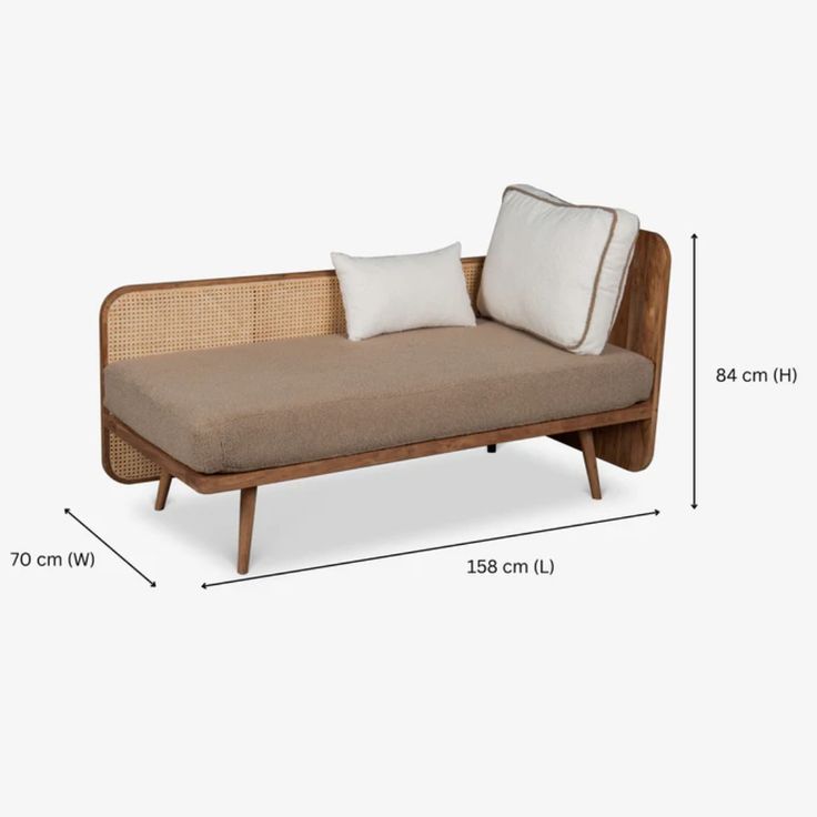 a couch with two pillows on it and measurements for the seat height, from front to back