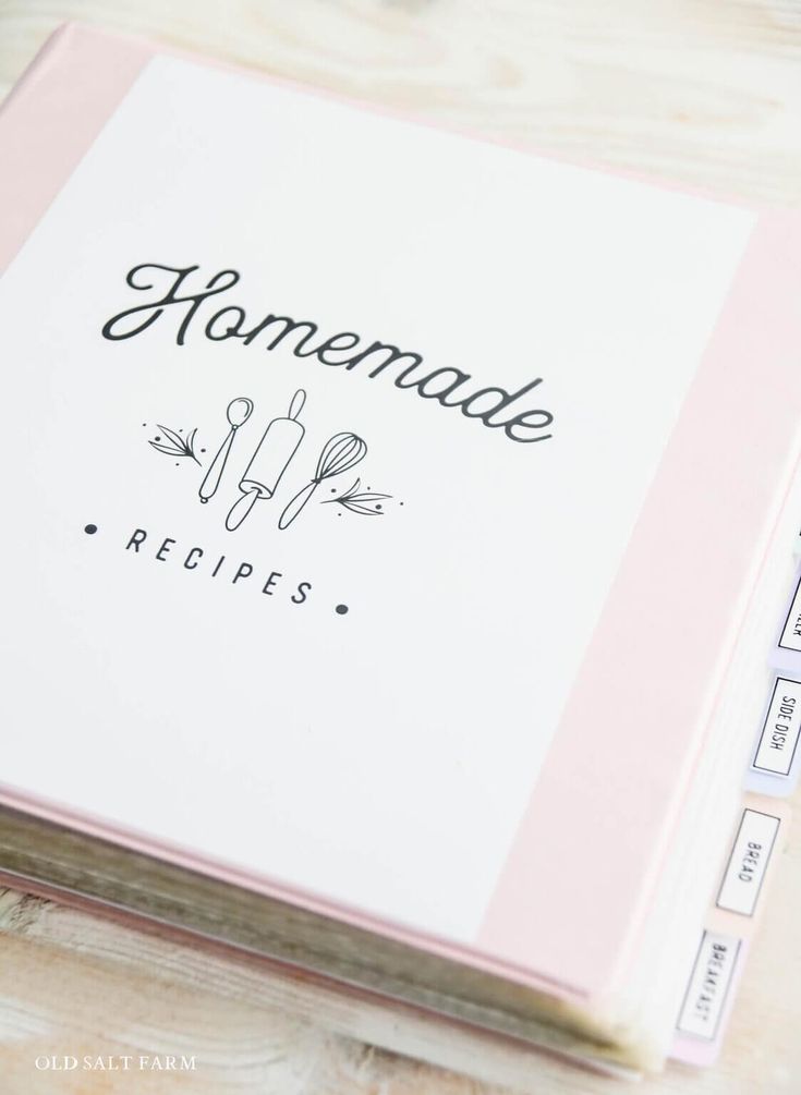 a recipe book sitting on top of a wooden table