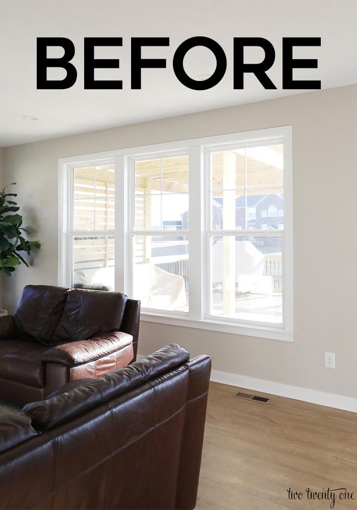 before and after shot of a living room with leather couches, large windows, and wood flooring