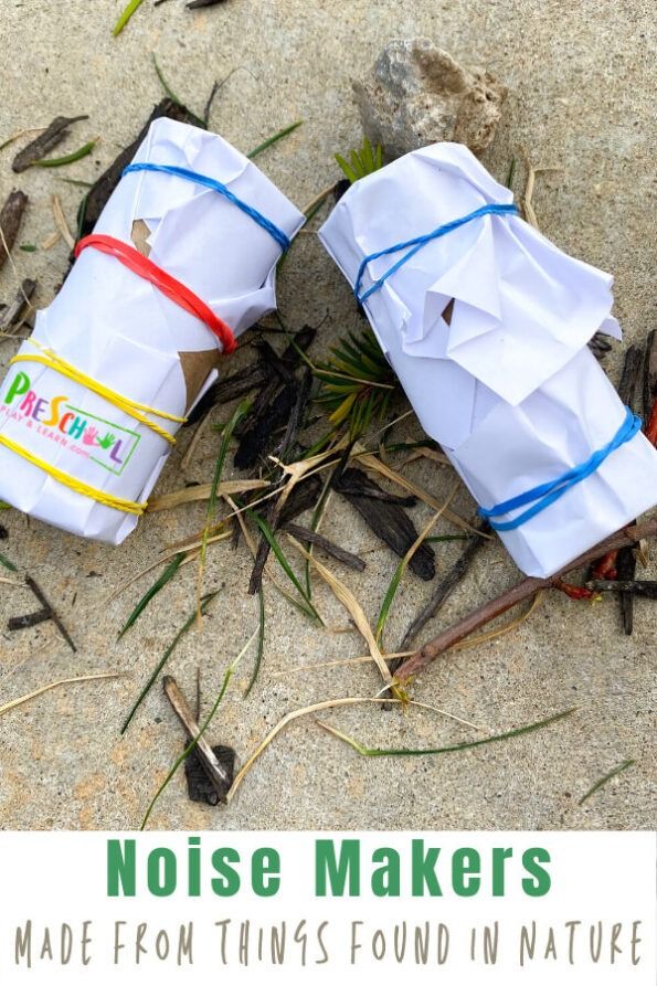 two paper bags sitting on the ground next to some grass and twigs with text reading noise makers made from thins found in nature