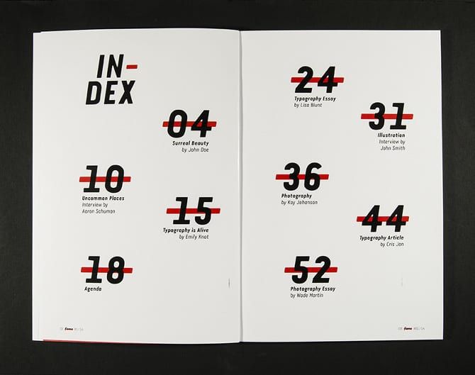 an open book with numbers and symbols on the pages that are red, black, and white