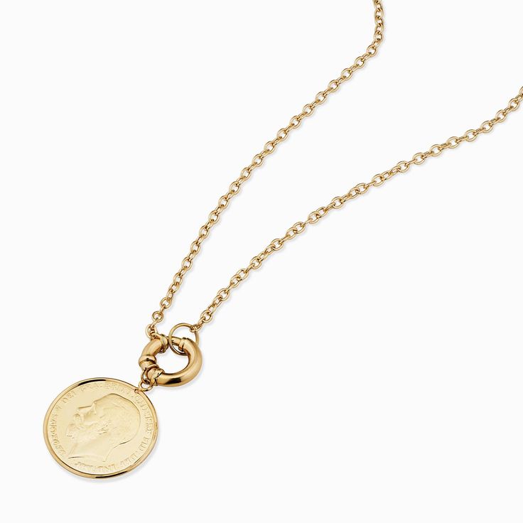 Our Majesty Coin Necklace features the distinguished profile of King George, a symbol of regal heritage and history. Crafted with precision, the Majesty Coin Necklace is perfect for those who appreciate historical significance combined with contemporary style. Wear it solo for a minimalist look or layer it with other pieces for a chic statement. Timeless 14k Gold Coin Pendant Necklace, Elegant 14k Yellow Gold Coin Necklace, Yellow Gold Coin Pendant Necklace In Sterling Silver, Luxury Yellow Gold Medallion Necklace, Refined Yellow Gold Necklaces For Formal Occasions, Refined Yellow Gold Formal Necklaces, Refined Yellow Gold Necklace For Formal Occasions, Refined Formal Yellow Gold Necklaces, Formal Refined Yellow Gold Necklaces