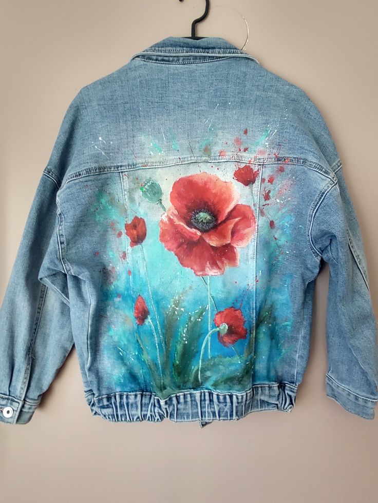 I have a very comfortable women's jacket painted for you. The poppies are painted with high-quality paint intended for fabrics. Back length - 60 cm The shoulder seam is dropped, so I give the sleeve length from the collar seam - 68 cm Width under armpit - 51 cm Size XS The jacket can be washed at 30 degrees by hand - I recommend or on a delicate fabric program, turned inside out, buttoned. We use delicate detergents, we do not use stain removers. All customs and tax fees when shipping abroad are Hand Painted Trendy Denim Jacket For Spring, Trendy Hand Painted Denim Jacket For Spring, Spring Denim Outerwear Hand Painted, Artistic Denim Outerwear For Spring, Artistic Cotton Outerwear For Spring, Artistic Fitted Denim Jacket For Spring, Artistic Cotton Spring Outerwear, Spring Hand Painted Denim Outerwear, Hand Painted Blue Outerwear For Spring