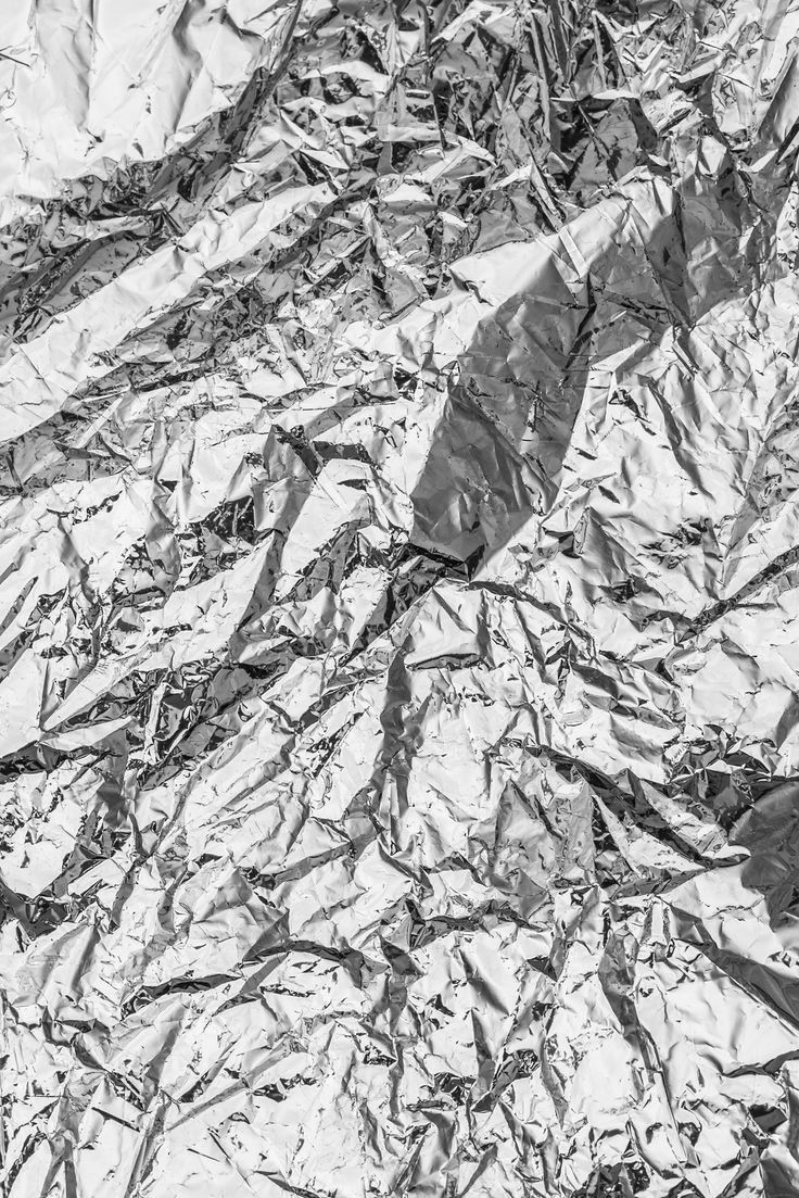 black and white photograph of crumpled aluminum foil