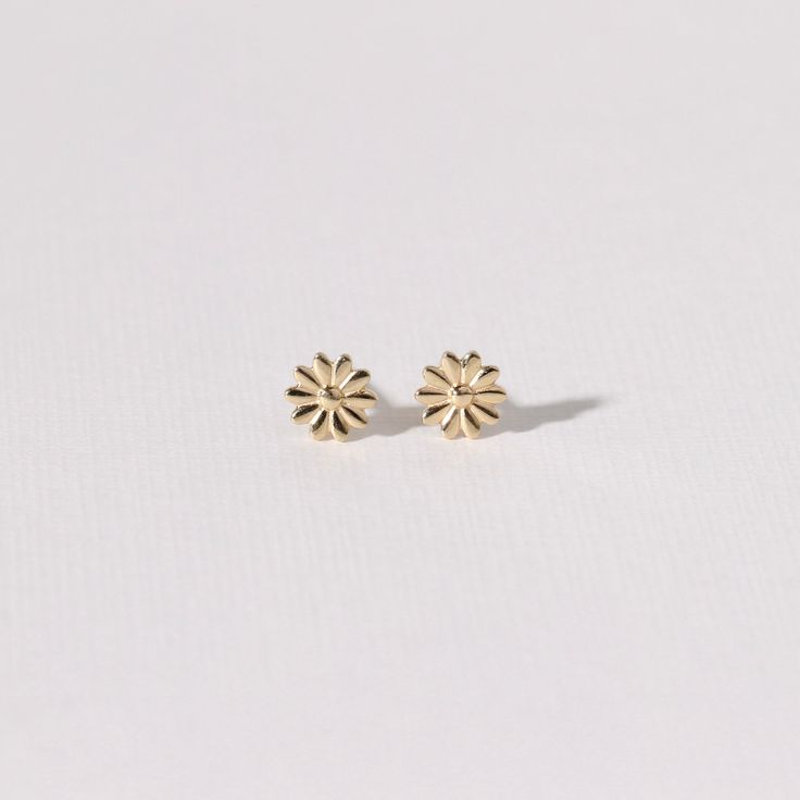 Our Sunflower Stud Earrings in 14k yellow gold. Sold in a pair. In stock. Ships out in 48 hours. Material type 14k solid gold Packaging Letrém logo jewelry gift box Delivery Free standard delivery 14k Yellow Gold Flower Earrings For Anniversary, Yellow Gold Flower-shaped Earrings For Anniversary, Anniversary Yellow Gold Flower Shaped Earrings, Yellow Gold Round Flower Earrings For Anniversary, 14k Yellow Gold Pierced Earrings, Fine Jewelry Earrings Made Of Recycled Gold, Tarnish Resistant 14k Gold Earrings For Gifts, Gold Flower Earrings For Anniversary, Tarnish Resistant Gold Flower Earrings For Anniversary