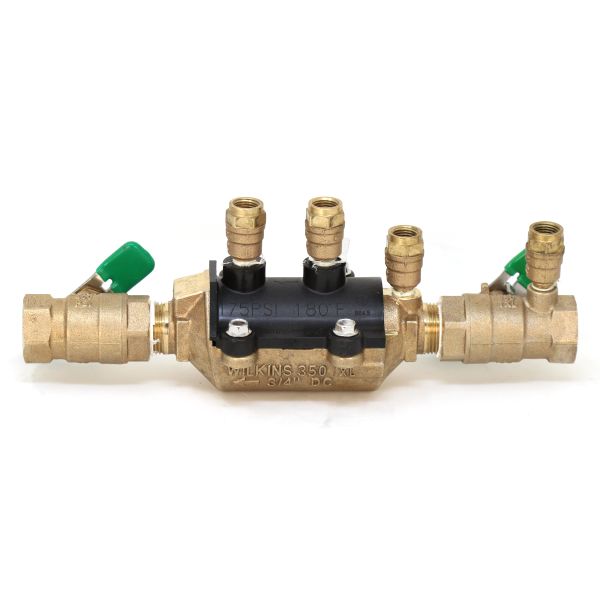 three brass valves on a white background