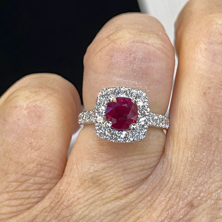 Burmese Ruby and Diamond ring. GIA certified Burmese Ruby with certificate. The most sought after and valued is the Burmese Ruby. Simply classy and timeless design ring. Excellent craftsmanship, the diamonds are white and very sparkling. The diamonds are nice sizes, so the ring is substantial. This quality heirloom ring is one that can be passed down from generation to generation. Genuine Burmese Ruby Gem Quality 2.05 Carats Cushion Cut Rich red color and vibrant GIA Certificate Included Genuine Luxury Gia Certified White Gold Ruby Ring, Luxury Cushion Cut Ruby Ring With Diamond, Gia Certified Cushion Cut Sapphire Ring, Luxury Ruby Ring With Round Cut And Prong Setting, Gia Certified Fine Jewelry Ruby Ring In Platinum, Luxury Ruby Ring With Prong Setting, Luxury Round Cut Ruby Ring With Prong Setting, Gia Certified Platinum Ruby Ring In Fine Jewelry, Gia Certified Platinum Ruby Ring