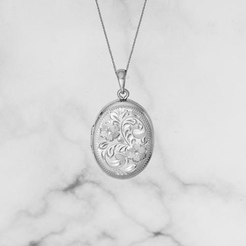 Sterling Silver Engraved measuring 21mm. Oval Locket on 16/18" Cable Chain Luxury Engraved Oval Pendant Locket Necklace, White Oval Locket Necklace With Engraving, Engraved Oval Sterling Silver Locket Necklace, Silver Etched Oval Locket Necklace, Silver Oval Locket Necklace Nickel-free, Antique Engraved Oval Locket Necklace, Oval Locket, Family Traditions, Cable Chain