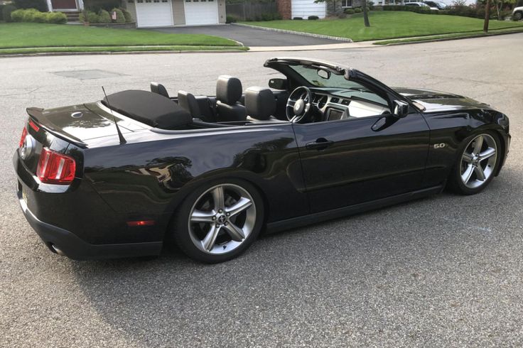 a black sports car parked on the street