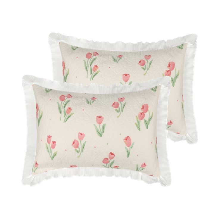 two pillows with pink flowers on them