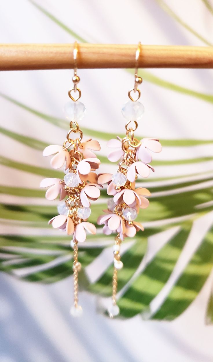 |Botanical garden collection| This collection of earrings are elegant, Japanese style and with dreamy colours. They are all eye-catchy. An ideal gift for yourself or for your loved one. |Pink/White floral| This pair of earrings are hanged from 925 silver coated base earrings component. |Shipping| Free UK delivery royal mail 2nd class and free international delivery for over £60 purchase. I will refund you the shipping cost after your purchase. Dispatch next day. Worldwide shipping is available a Elegant Summer Jewelry With Flower Decoration, Elegant Handmade Summer Flower Earrings, Feminine Drop Earrings For Spring, Whimsical Dangle Jewelry With Flower Charm, Summer Jewelry With 3d Flower Shapes, Pink Dangle Flower Earrings Gift, Pink Dangle Flower Earrings For Gift, Elegant Flower Charm Earrings For Summer, Whimsical Pink Dangle Flower Earrings