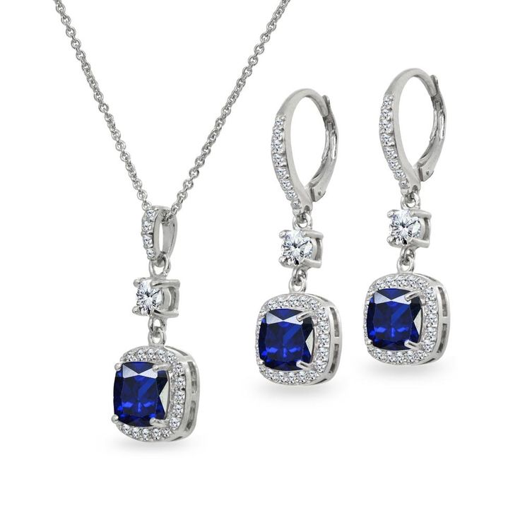 The perfect accesory for any occasion, this jewelry set is a beautiful addition to any jewelry collection. This set showcases sparkling cushion-cut stones surrounded by a halo of cubic zirconia stones. The earrings secure by post with friction-backs and the necklace secures by a spring-ring clasp. The pendant hangs from a delicate 18 inch rolo chain. This set is crafted of fine sterling silver. Product Details Metal Type sterling-silver Metal Stamp 925-sterling Weight 8GR Length 18IN Width 11MM Elegant Rectangular Gemstone Pendant Jewelry, Elegant Rectangular Pendant Gemstone Jewelry, Sapphire Rectangular Pendant Jewelry For Gift, Elegant Sapphire Square Pendant Jewelry, Blue Square Pendant Jewelry For Formal Occasions, Formal Blue Square Pendant Jewelry, Silver Jewelry With Detachable Cubic Zirconia Pendant, Fine Jewelry Sapphire Rectangular Jewelry, Fine Jewelry With Rectangular Pendant For Formal Occasions