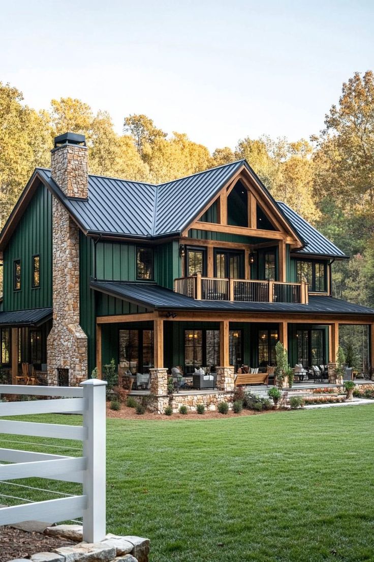 a large green house sitting on top of a lush green field